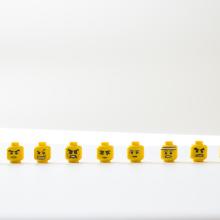 lego heads showing various emotions